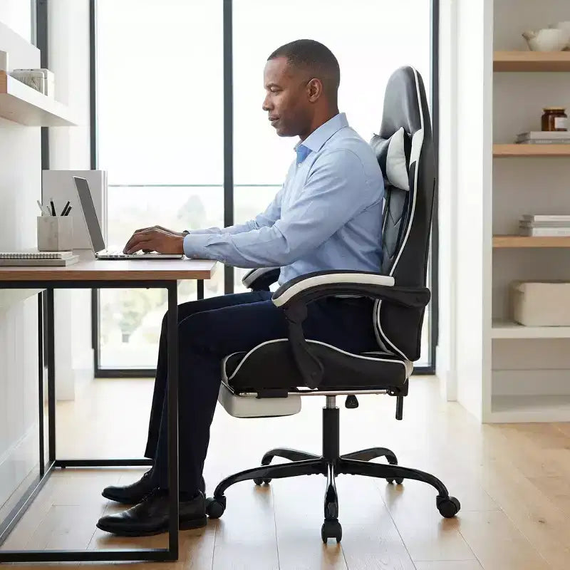 Chaise de jeu ergonomique avec repose-pieds, coussin lombaire massant, appui-tête et capacité de 150 kg