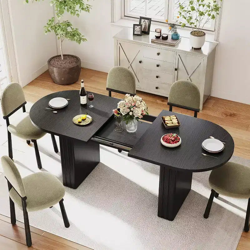 Table à manger ovale extensible pour 4 à 8 personnes – Finition effet travertin, coins arrondis, noire